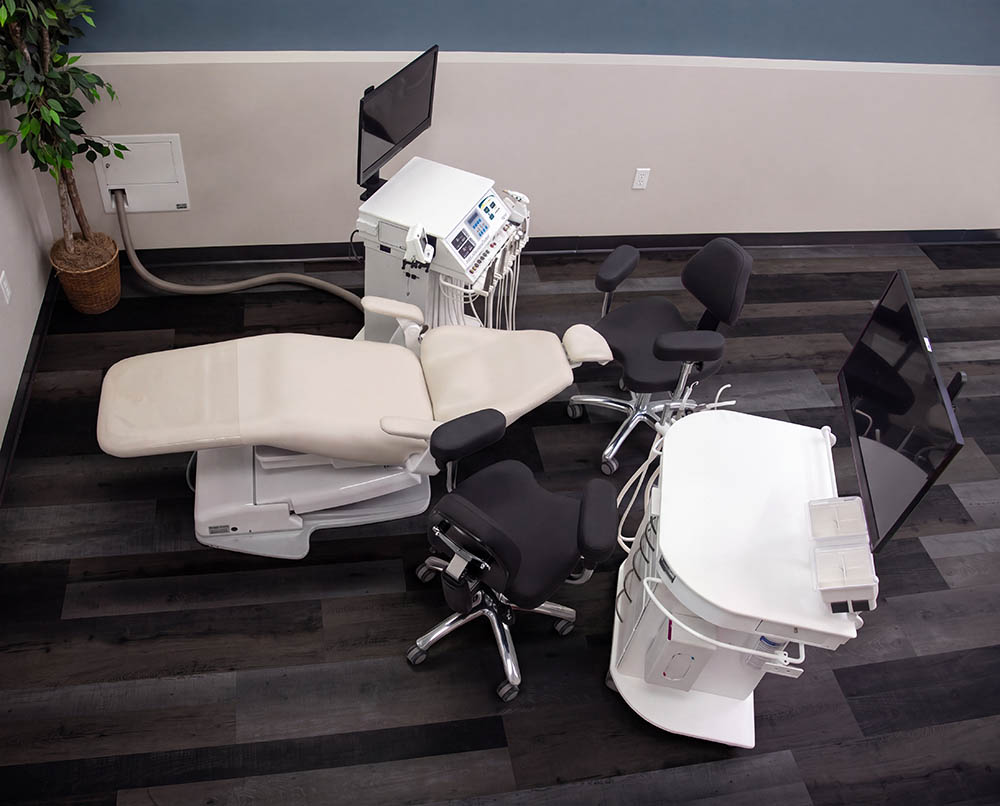 10' x 12' operatory with classic cart and freedom assistants cart with in-wall junction box