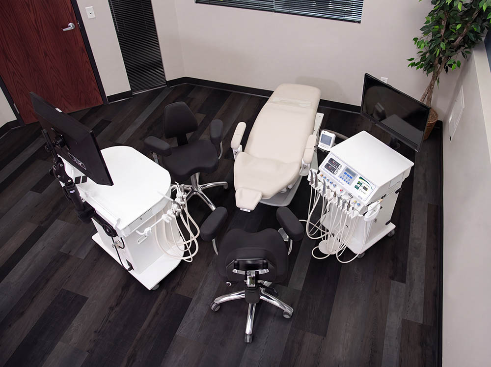 10' x 12' operatory with classic cart and freedom assistants cart with in-floor junction box